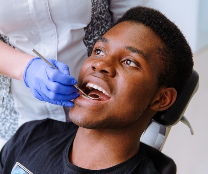 Man receiving a dental checkup